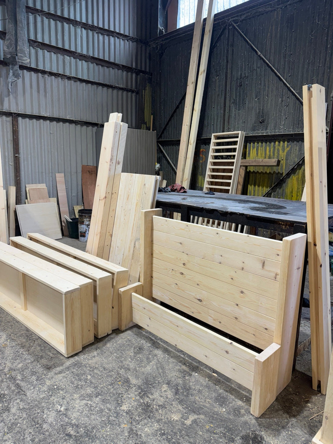 Handmade wooden furniture in its bare bones for a Whitby Airbnb project