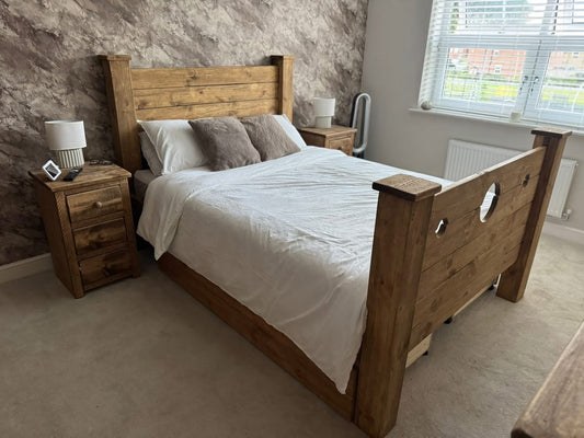 The Jester Bed handmade rustic BDSM wooden bed in a styled bedroom