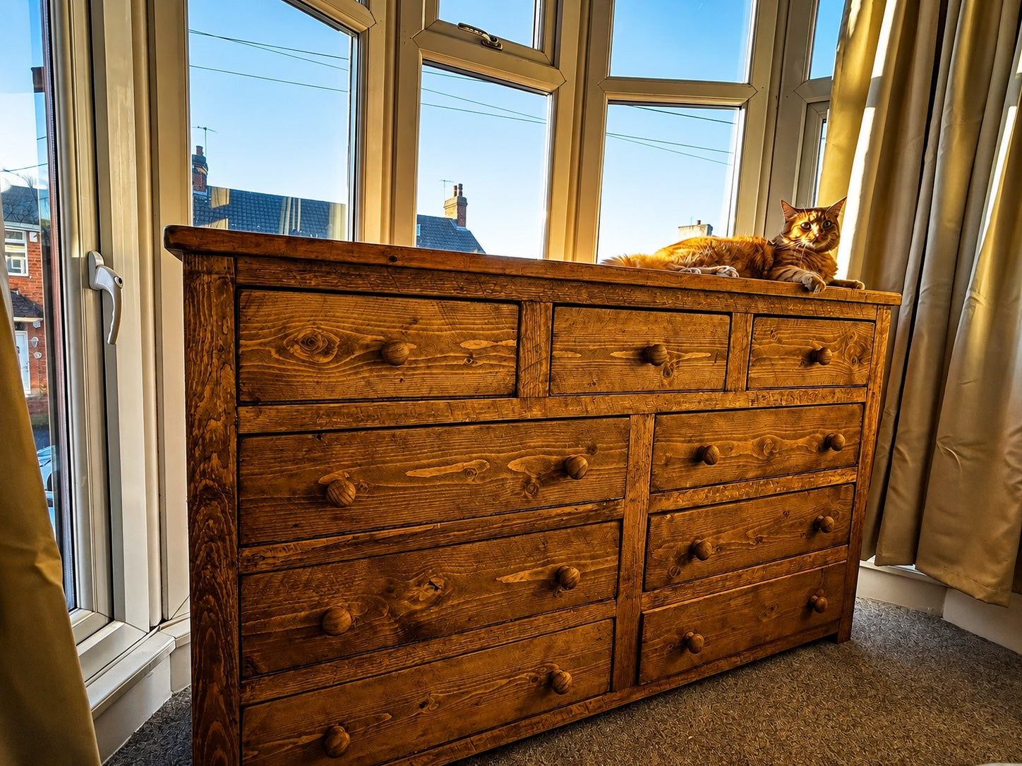 Handmade rustic wooden nine drawer chest of drawers